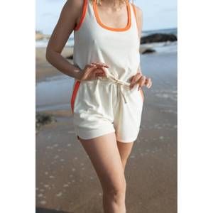 NEW FEAT breezyblend romper in oatmilk/coral
